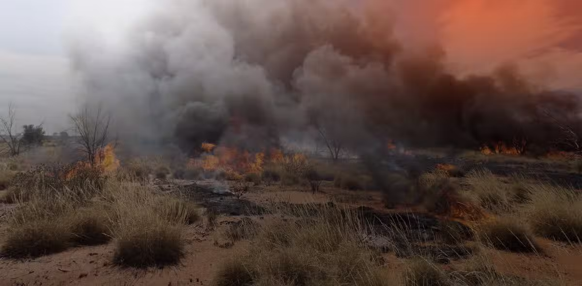 fire in an arizona field creating lots of smoke and damage